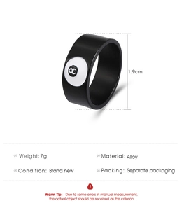 Detail of 1.9cm wide black alloy ring with number 8 billiards ball design and 7g weight