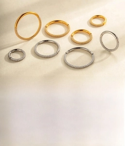 Titanium alloy nose rings with cubic zirconia in gold and silver finish, 6-12mm sizes