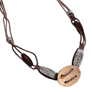 Detail of woven brown rope belt with ethnic wood beads and silver metal floral spacers