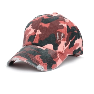 Close-up of pink camo ponytail baseball cap with LF embroidery and distressed holes