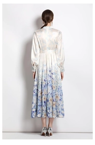 Detailed back view of a satin floral dress featuring a high collar and long lantern sleeves