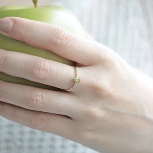 French vintage S925 silver gold twisted ring with round olive green gemstone worn by model