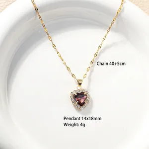 Gold plated heart pendant necklace with red crystal and sparkling diamond accents