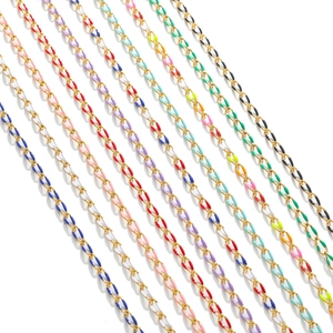 Detailed macro view of colorful drip oil enamel links on 3.7mm golden stainless steel chain