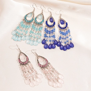 Bohemian crystal fringe drop earrings in blue and pink tones with teardrop design