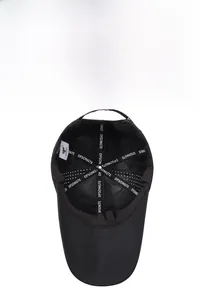 Detail view of the breathable mesh lining and branded inner tape on the black baseball cap