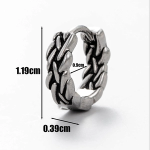 Macro shot of silver skull earring showing 1.19cm height and 0.9cm inner diameter