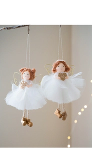Detail of Christmas angel doll ornaments with knit fabric, gauze skirts and gold accents