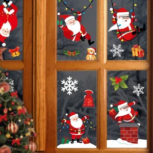 Christmas window decals set featuring Santa Claus and snowflakes for festive glass decoration
