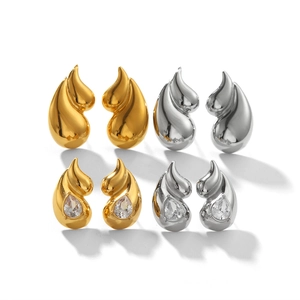 Double teardrop stainless steel stud earrings in gold and silver with crystal accents