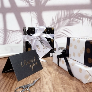 Gift wrapping paper set with balloons patterns, gold ribbons and thank you cards