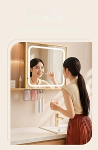 Wall-mounted magnetic toothbrush holder with two textured cups in a bathroom setting