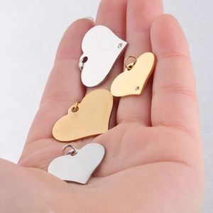 Polished stainless steel heart pendants with crystals in gold and silver finish