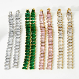 Long tassel earrings with rectangular cubic zirconia in silver and gold color variations