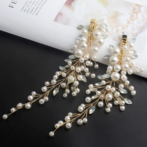 Handmade bridal hair clips with white pearls, gold wire branches and light blue beads