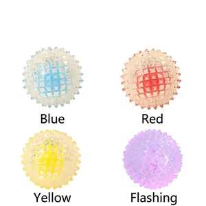 Spiky rubber dog toy balls for teeth cleaning and fetching in red, blue, yellow, and flash