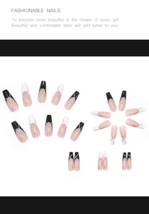 Close-up of long coffin press-on nails featuring French style with gold glitter lines