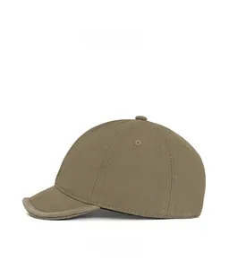 Side profile of a retro short brim baseball cap in khaki twill cotton fabric
