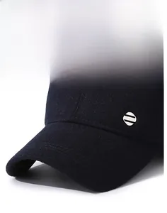 Detailed close-up of dark blue wool baseball cap with stiff brim and sport metal logo