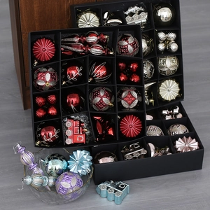 Assorted colorful glittery Christmas tree ornaments in decorative gift box set