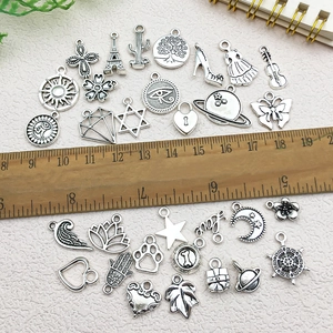 Antique silver alloy charms set with Eiffel Tower and butterfly for DIY jewelry