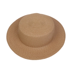 Detailed top-down macro view of woven straw texture and flat top design of the sun hat