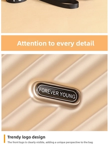 Detailed view of champagne gold mini hard shell suitcase with Forever Young logo