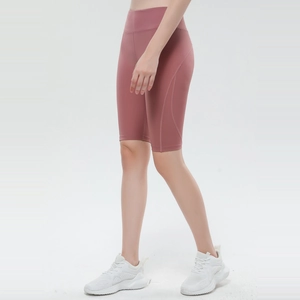 Women's high-waisted yoga shorts in dusky rose pink with breathable stretch fabric