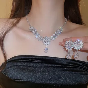 Elegant zircon wheat flower water drop jewelry set with necklace and earrings on a model