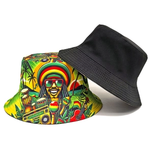 Reversible bucket hat featuring black solid side and colorful reggae style print pattern
