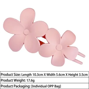 Detail view of pink matte flower hair claw clip with dimensions 10.3x5.6x3.5cm