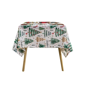 Christmas tablecloth with green trees and red snowflakes for festive holiday dining decor