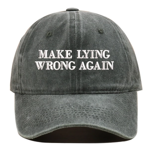 Detailed view of Make Lying Wrong Again white embroidery on a washed dark gray denim cap