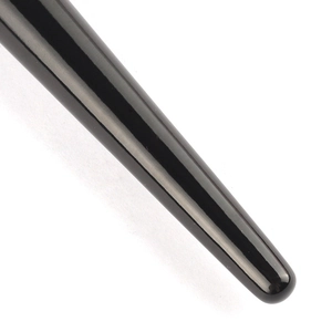 Minimalist black sickle-shaped contour brush with glossy handle and sleek tapered design