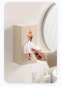 Boîte à mouchoirs murale créative avec une fille de dessin animé dont le papier fait la jupe