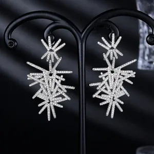 Elegant silver snowflake starburst drop earrings with sparkling pavé cubic zirconia