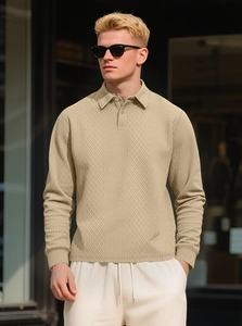 Detailed view of men long sleeve knit polo shirt featuring textured diamond pattern