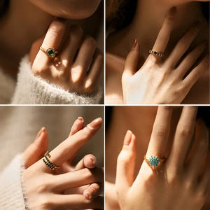Luxurious 18K gold-plated zircon rings featuring emerald green and turquoise stones