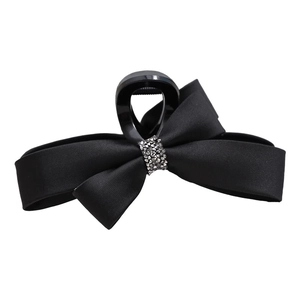 Premium black satin bow claw clip with sparkling rhinestones center on white background