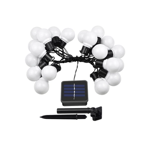 Solar outdoor G50 LED string lights with round white bulbs and solar panel ground stake