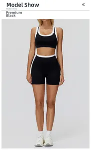 Detailed view of black and white contrast high-waisted waistband on sports yoga shorts