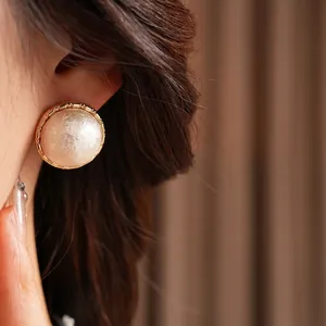 French vintage gold plated round stud earrings with white marble texture inlay for women