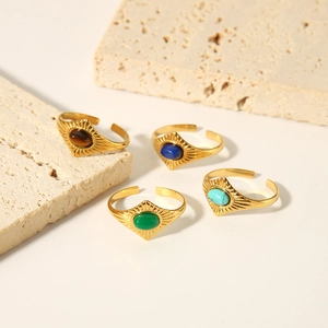 Détails de bagues vintage en acier doré 18 carats avec pierres précieuses ovales