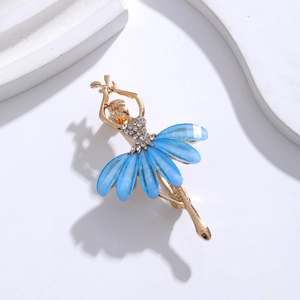 Elegant gold ballerina brooch with blue enamel dress and sparkling white crystals