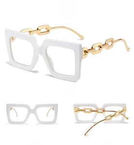 Three-view display of white oversized frames with gold chain-link temple detail