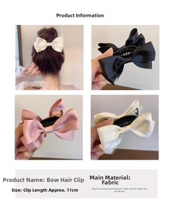 Detail view of large satin bow hair claws in black, pink, and beige, 11cm length