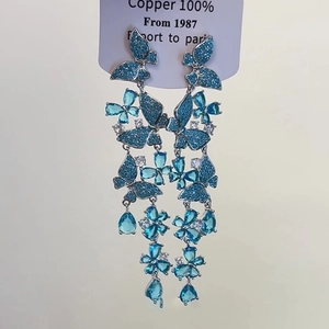 Funkelnde blaue Schmetterlings-Ohrhänger aus 100% Kupfer mit langen Quasten und Silberstift