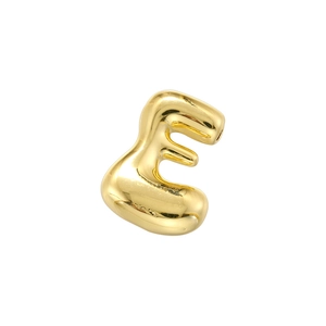Close-up of golden 3D bubble capital letter E charm with polished metallic finish