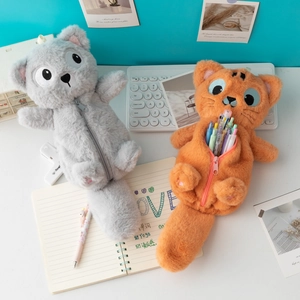 Détails de trousses chat en peluche grise et orange avec de grands yeux et une queue