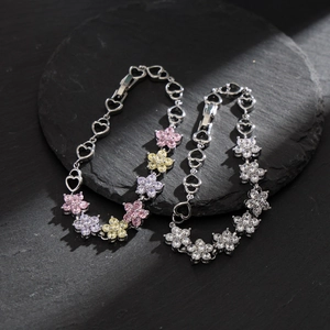Snowflake zircon flower bracelet with heart-shaped links in silver finish and colorful gems
